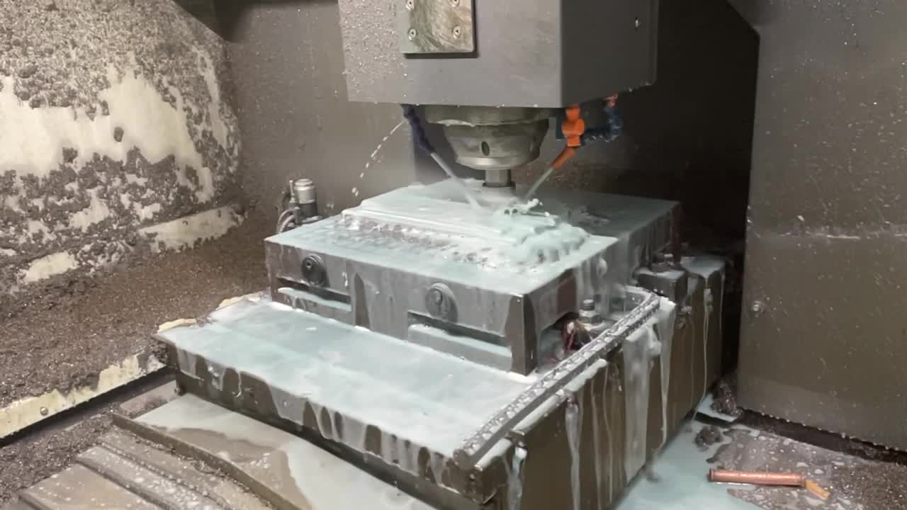 CNC milling center machining a titanium aerospace component at Saiguang facility