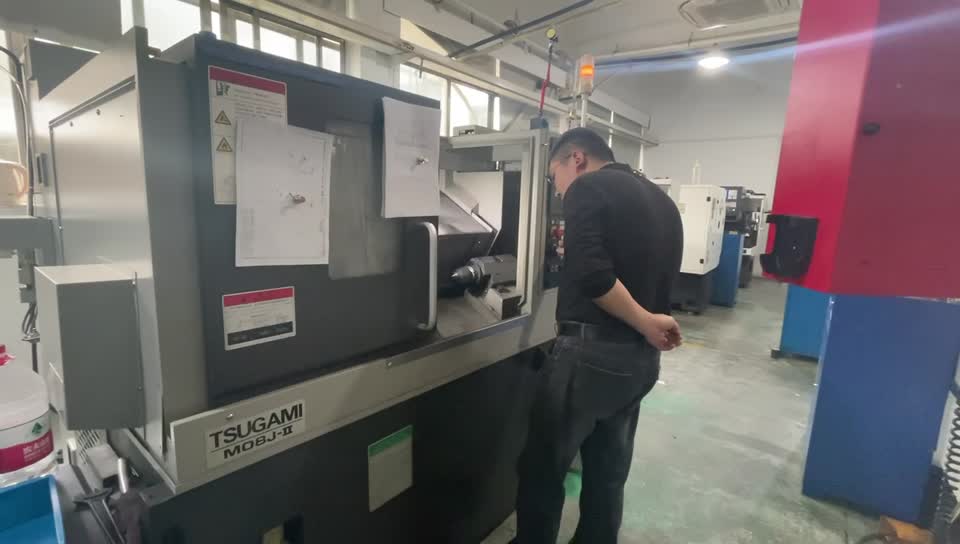 Tsugami CNC turning center for precision titanium part production